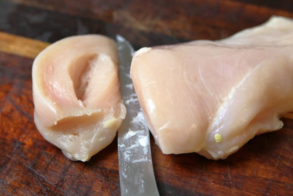 prepping chicken, preparing to be bacon wrapped