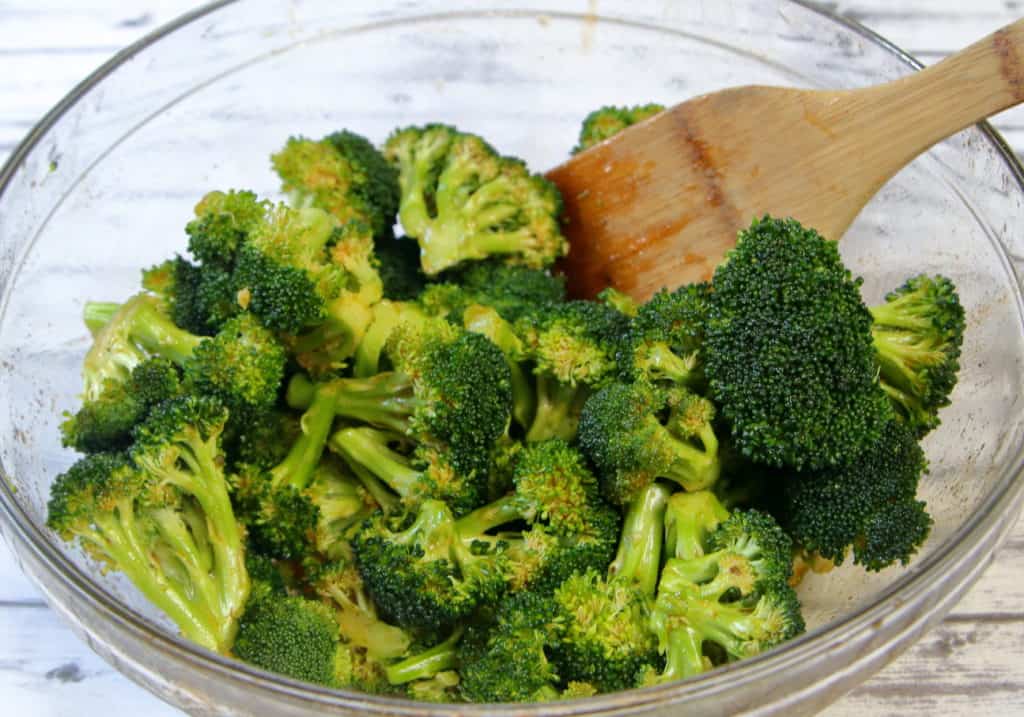 Broccoli florets coated with honey sriracha mixture