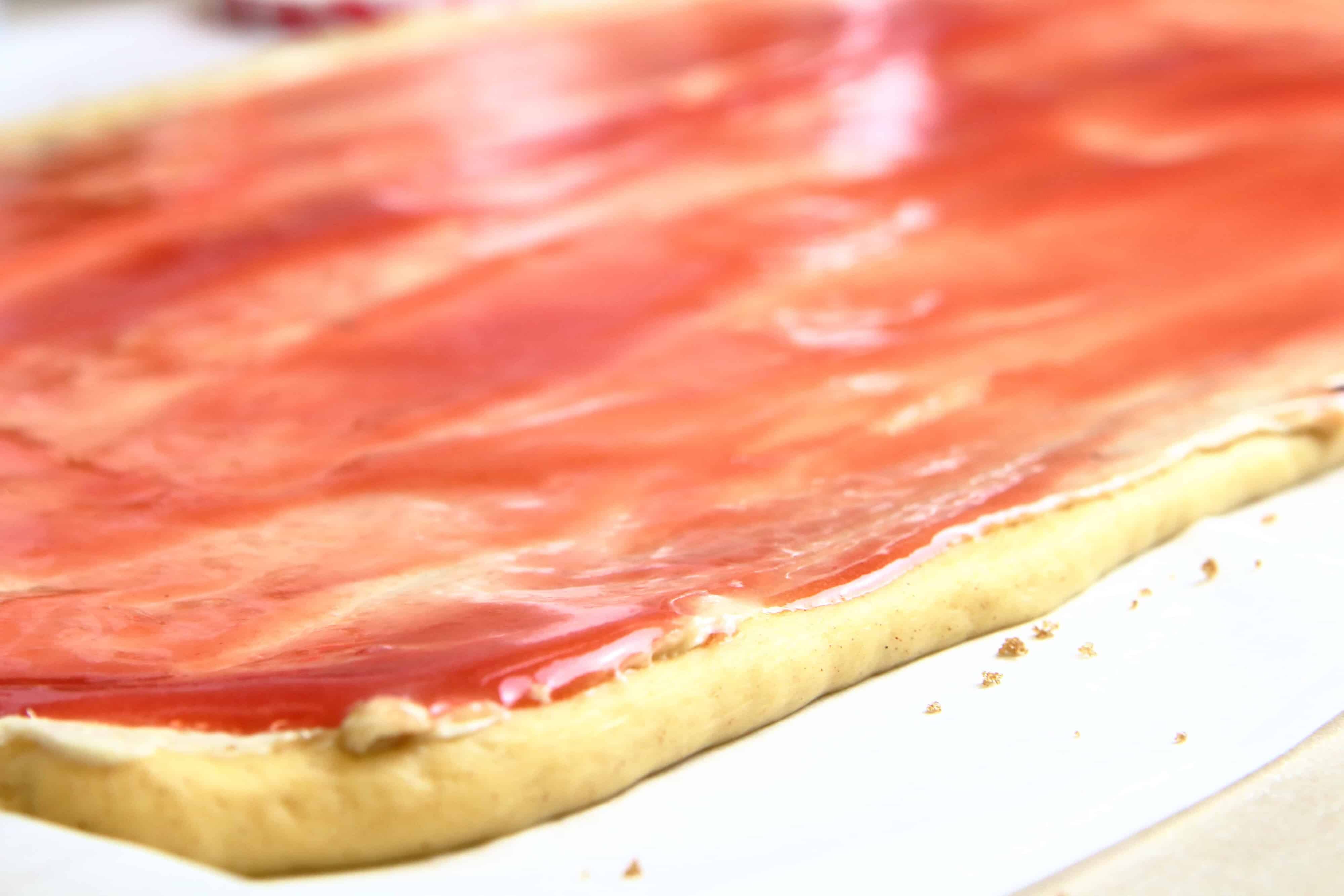 Mardi Gras King Cake with Strawberries and Cream System of a Brown