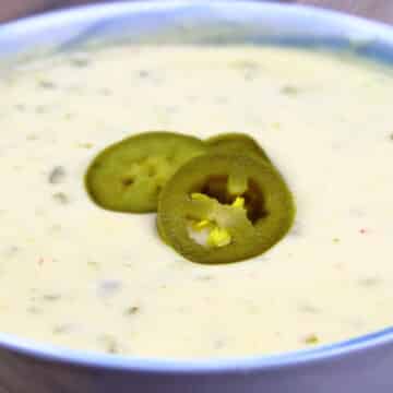 Bowl of queso blanco with jalapeno topper