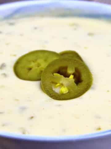 Bowl of queso blanco with jalapeno topper
