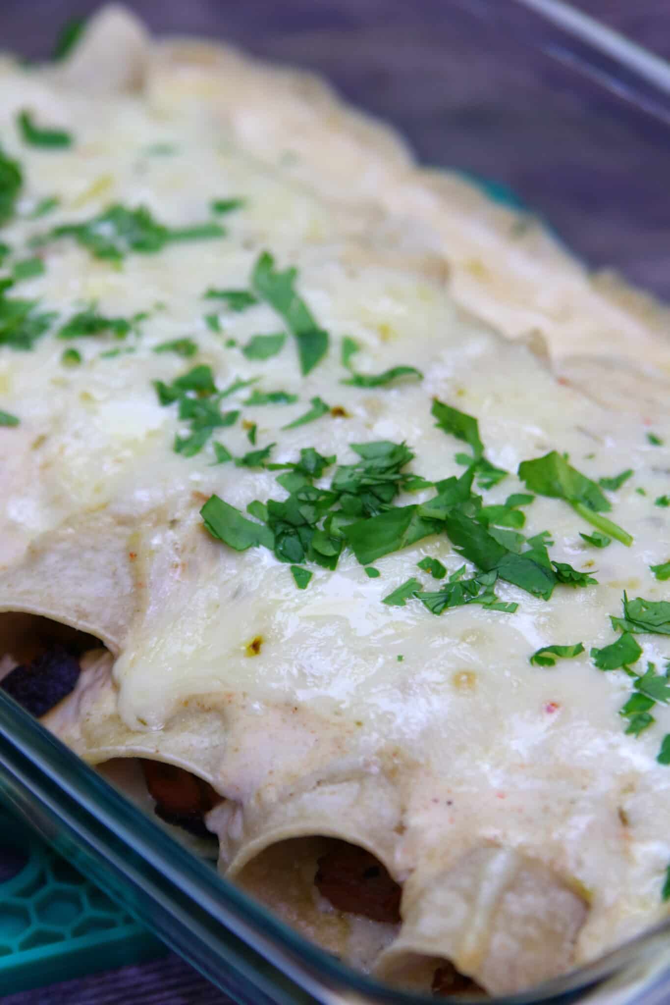 Leftover Pulled Pork Enchiladas with Green Chile Sour Cream Sauce