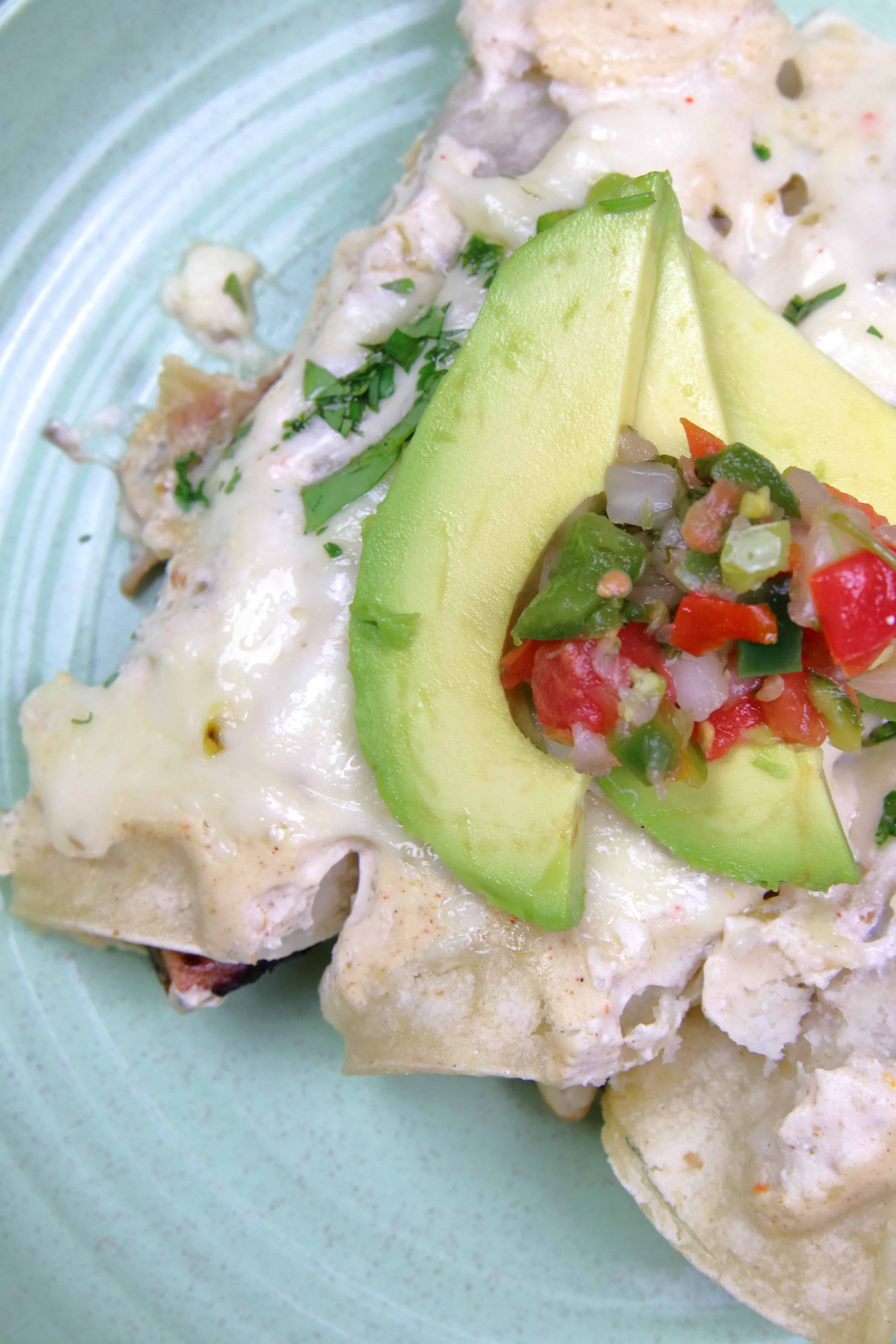 Leftover Pulled Pork Enchiladas with Green Chile Sour Cream Sauce