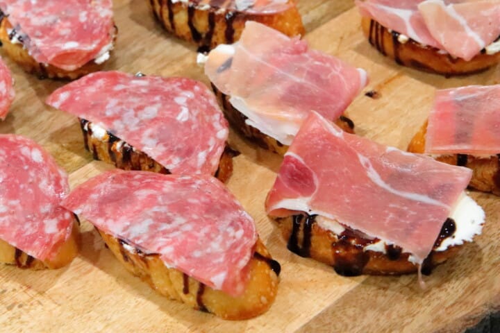 Goat Cheese Crostini with Prosciutto and Arugula | System of a Brown