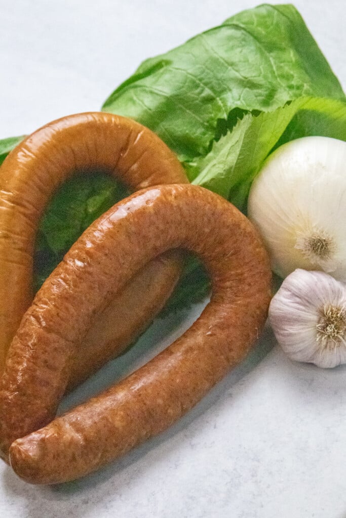 sausage, greens, onion, and garlic